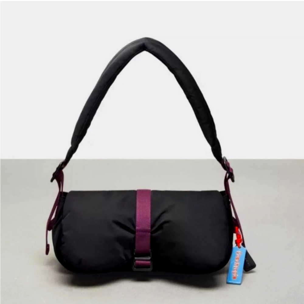 Coachtopia Black and purple grape puffer loop purse. used once, extremely cute.